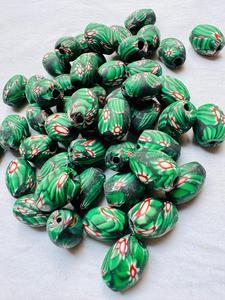 Perles de verre africaines rayées en gros |   Perles en forme de baril à rayures colorées |   Boîte à bijoux en perles de verre jaunes, noires et vertes en vrac - Product Image 3