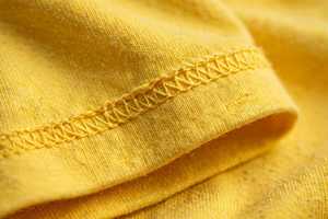 Camiseta de Verano para Mujer, Talla Grande, Cuello Redondo, Manga Corta, Color Sólido, Algodón Amarillo, con Logotipo Estampado en la Parte Delantera, de Alta Calidad - Product Image 5