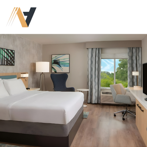 Ensemble de meubles d'hôtellerie comprenant un lit, un bureau et une armoire pour les projets de chambre d'hôtel Hampton by Hilton - Product Image 1