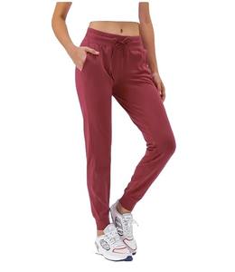 Pantalones cargo para mujer, conjunto de ropa deportiva y de descanso informal con patrón liso, al por mayor, con cremallera y pantalones jogger para la temporada. - Product Image 1