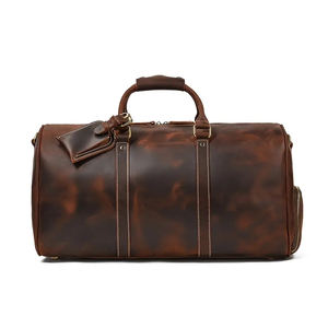 Sacs de voyage en cuir PU imperméables de luxe, couleur unie, design OEM, meilleur fabricant, logo personnalisé, sacs de voyage portables en cuir PU - Product Image 1