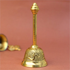 Brass ritual hand bell featuring a prominent Om symbol handle, available at wholesale prices. - Product Image 3