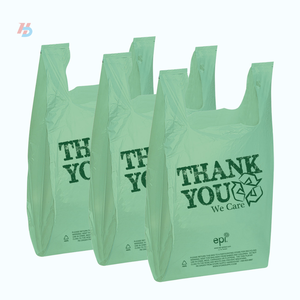 Epi. Bolsas de camiseta verdes de LDPE con fuelle lateral y asa tipo chaleco, reciclables, personalizables, serigrafiadas con 'Thank You We Care', para negocios. - Product Image 1