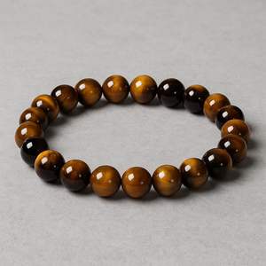 Venta al por mayor Natural Tiger Eye Stone Bracelet Healing Crystal Gemstone Jewelry en venta de Aameena Agate - Product Image 1