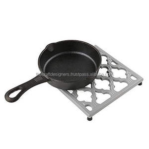 Elegant Metal Sculpted <b>Trivet</b> For Dining Table Designed To Add Sophistication And Function To Tabletop Arrangements - Product Image 1