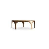 Table basse ovale tendance en aluminium moulé artisanal, finition laiton antique foncé, pour salon moderne ou bureau