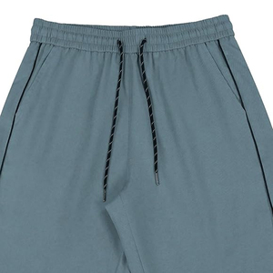 กางเกงแทร็คผู้ชายทรงหลวมสไตล์เทรนดี้ OEM ผู้ผลิตเสื้อผ้าสตรีทแวร์ขนาดใหญ่ - Product Image 4