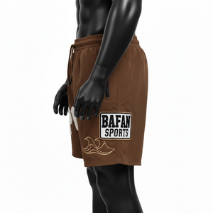 กางเกงว่ายน้ำชายคุณภาพสูง 140 GSM แห้งเร็ว ผลิตจากโพลีเอสเตอร์ สีน้ำตาลครีม ปักโลโก้ด้วยผ้าเชนิลล์ เหมาะสำหรับใส่ไปชายหาด - Product Image 4