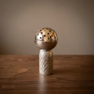 Stunning Metal Incense Burner With Textured Column Base And Perforated Globe Lid Creating <b>Magic</b> Fragrant Smoke Patterns Anywhere - Product Image 1