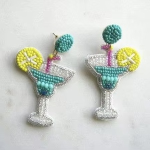 Handmade Beaded Hummingbird <b>Earrings</b> Beads Embellished Hand Crafted Parrot <b>Stud</b> <b>Earrings</b> from the brand BaubleBar - Product Image 3