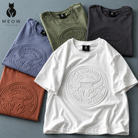 T-shirt unisexe en coton à épaules tombantes, style streetwear, avec logo classique en relief, disponible en blanc, rouge, marine, noir et multicolore, vente en gros