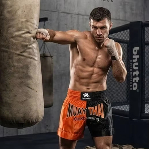 กางเกงมวยไทยพรีเมียม ผ้าซาติน สกรีนโลโก้ได้ ออกแบบเองได้ สำหรับคิกบ็อกซิ่ง MMA ฝึกซ้อม ระบายอากาศได้ดี ทรงหลวม ใส่ได้ทั้งชายและหญิง - Product Image 1
