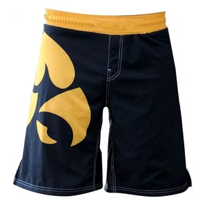 Shorts MMA pour homme, noir et jaune, impression par sublimation, évacuation de l'humidité, coupe classique, vêtements de sport - Product Image 1
