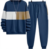 Ensemble de survêtement homme color block avec sweat-shirt à col rond et pantalon à cordon de serrage, coupe décontractée à manches longues pour l'automne