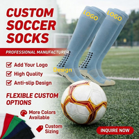 Chaussettes de football personnalisées à forte valeur ajoutée Chaussettes à prise en main d'usine Chaussettes antidérapantes