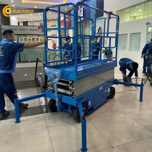 Plateforme élévatrice à ciseaux électrique 300 kg 14 m 220 V remorquable avec acier Q345 et stabilisateurs pour une portée de 16 m - Product Image 6