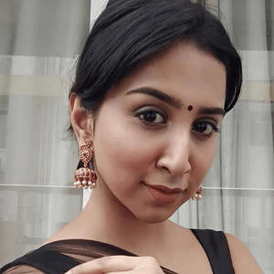 Ruby Kemp Peacock Charm Earrings-Classic Pearl & Diamond Style for Wedding Party - Product Image 1