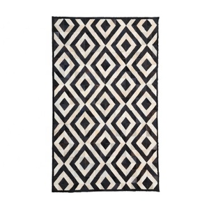 Handmade <b>Black</b> & Cream Patchwork Cowhide Fur Leather <b>Rug</b> Luxury Carpet For Indoor & Outdoor Home And Office Decor - Product Image 1