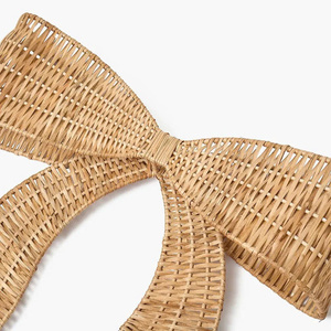 Nouvelle arrivée : étagère suspendue en rotin en forme de nœud pour la décoration des enfants, fabriquée au Vietnam, prix de gros, OEM, ODM, couleur au choix. - Product Image 2