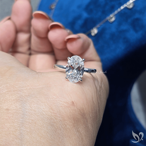 แหวนเพชรทรงรี 3 กะรัต ผลิตในห้องปฏิบัติการ ได้รับการรับรองจาก IGI |   แหวนทองคำแท้ 10k ประดับเพชรเม็ดเดี่ยวทรงกลม พร้อมวงแหวนรอบนอกแบบซ่อน ได้รับการรับรองจาก IGI - Product Image 5