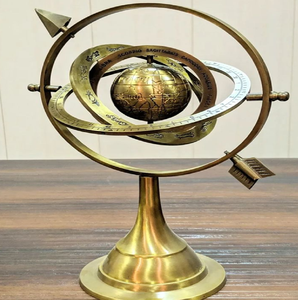 Premium brass armillary sphere globe on winged lion pedestal base with built-in <b>compass</b>, available at wholesale prices. - Product Image 2