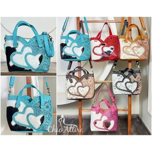 กระเป๋าโท้ทหนังแท้ลายหัวใจประดับหมุดโลหะสำหรับผู้หญิง งานแฮนด์เมดจาก March Expo ดีไซน์ทันสมัย เหมาะสำหรับร้านบูติก - Product Image 1