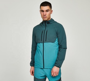 เสื้อแจ็คเก็ตผู้ชายแบบมีฮู้ด กันน้ำ กันลม ผ้า softshell ระบายอากาศได้ดี ซิปแบบรูดขึ้นลง เสื้อโค้ทสำหรับฤดูหนาวกลางแจ้ง ไนลอน 100% รับสกรีนโลโก้ - Product Image 2