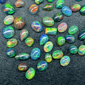 Lot de cabochons ovales en opale noire d'Éthiopie naturelle |   Opale noire polie de qualité AAA, 100% authentique |   Feu vert multi-étincelant 6mm-12mm - Product Image 1