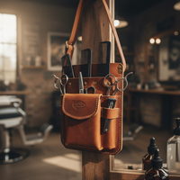 OEM Logo personnalisé Vente en gros Étui en cuir pour coiffeur Salon de coiffure Trousse à ciseaux Ceinture à outils Sac à bandoulière Étui pour styliste professionnel
