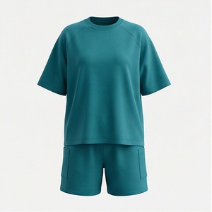 Ensemble de shorts en tricot 2 pièces pour femmes, couleur unie, col rond, manches courtes, coupe ample, au-dessus du genou, respirant, vêtements décontractés - Product Image 1