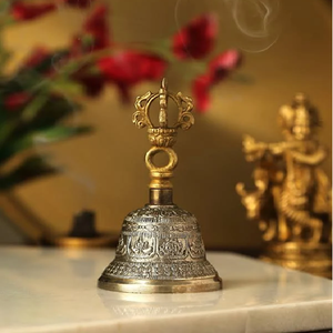Traditional antique brass hand bell topped with a divine Nandi bull finial, available at wholesale prices. - Product Image 3