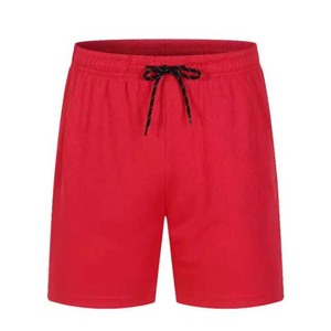 Fabricante de pantalones cortos ligeros de poliéster color rojo por Hosten Greek Enterprises - Product Image 1