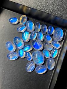 มูนสโตนสีขาวรุ้งรูปไข่แบบคาโบชอง  พร้อมแสงสีฟ้า  ขนาด 6x4 มม. ถึง 10x14 มม. สำหรับทำเครื่องประดับ - Product Image 4