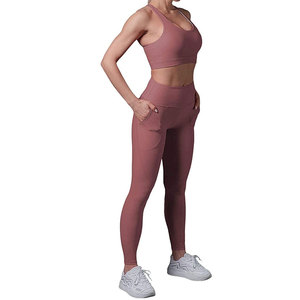 Women's Seamless High Waist Yoga Set Solid Pink Racerback Sports Bra Full Length Leggings With Pockets 2 Piece - Product Image 1