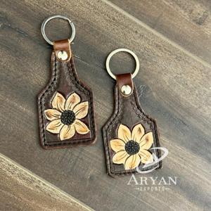 Nouveautés Cadeaux promotionnels Porte-clés en cuir repoussé à la main de haute qualité Porte-clés en cuir véritable avec logo de créateur de luxe personnalisé - Product Image 1