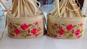 Elegant Handcrafted Floral Embroidered Potli Bag Set Traditional Golden Silk <b>Wristlet</b> with Vibrant Pink Blossom Artistry - Product Image 2