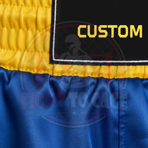Shorts de boxe en polyester respirant de qualité supérieure - Couleurs et logo personnalisés - Entraînement professionnel pour MMA/Kickboxing - Product Image 4