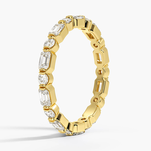 Anillo de Eternidad Completo con Diamantes Redondos y Esmeraldas con Engaste Alternado LR - Product Image 1