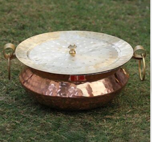 Rustic copper-bottom handi pairing a rich hammered base with a contrasting dual-tone flat lid. Available at wholesale price. - Product Image 1