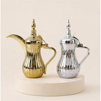 Cafetière arabe de luxe en acier inoxydable Dallah avec bec en bec d'aigle, théière traditionnelle dorée polie du Moyen-Orient pour hôtel