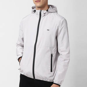 เสื้อแจ็คเก็ตกันลมแบบมีฮู้ด ผลิตในปากีสถาน รับผลิตจำนวนน้อย สีตามสั่ง ขายดี เป็นที่นิยมในวงการ  เสื้อแจ็คเก็ตซอฟต์บอล - Product Image 1