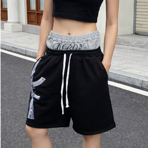 Shorts pour hommes noirs à double taille avec cordon de serrage, imprimé pistolet, style sport décontracté, taille mi-haute, en polyester, design respirant - Product Image 1