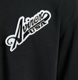 เสื้อยืดแขนสั้นสีดำสำหรับผู้ชาย Avirex ผ้าฝ้าย 100% แบบ OEM ODM สั่งทำพิเศษ พิมพ์ลายโลโก้ด้านหน้า สไตล์สตรีท ทรงปกติ ผ้าคอตตอนเจอร์ซีย์ - Product Image 3