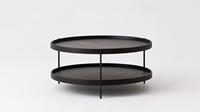 Table basse ronde moderne avec plateau en bois noir, structure en métal, design minimaliste, étagère de rangement, meubles de salon