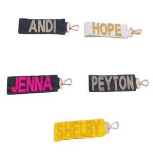 New Trending Minimalist Adjustable Fabric Keychains Mixed Designs Handmade Durability Gameday Themes Wristlet Keychains in 2026 - Product Image 1