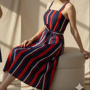 เดรสสายเดี่ยวทรงเอไลน์สำหรับผู้หญิง ดีไซน์เรียบง่ายทันสมัย ผ้าโพลีเอสเตอร์ 100% ระบายอากาศได้ดี แต่งกระดุม  ความยาวปานกลาง สวมใส่สบาย - Product Image 1