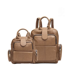 Sac à dos carré en cuir PU marron imperméable pour femme Hody Rania, idéal pour le quotidien, les voyages et les activités de plein air, avec bandoulière et fermeture éclair - Product Image 1