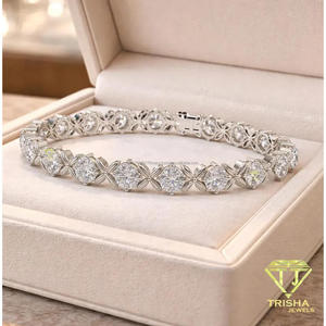 Elegante pulsera en tono plateado con piedras redondas transparentes y detalles florales metálicos abiertos para revendedores de joyería - Product Image 4
