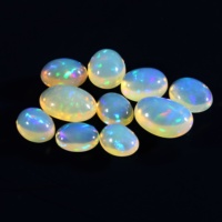 Opale d'Éthiopie Naturelle Ovale Flatback Cabochon Pierres Précieuses en Vrac Pierre Semi Précieuse Fabrication de Bijoux Fournisseur de Pierres Précieuses de Haute Qualité