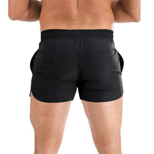 Shorts de sport gris uni coupe-vent à séchage rapide pour homme avec poches, taille élastique, longueur mi-cuisse, en toile de coton - Product Image 4